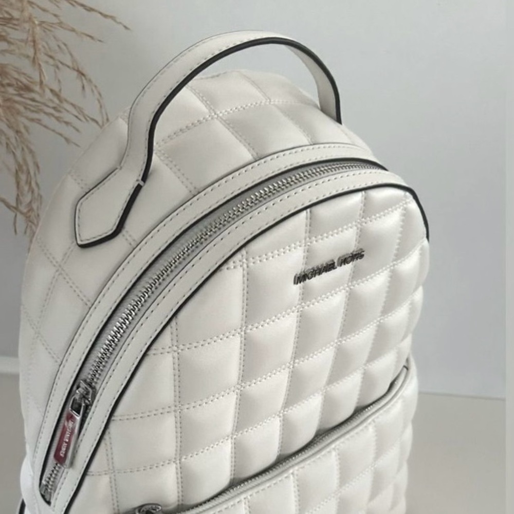 Michael Kors White Quilted Leather Backpack Silver Hardware Front Zip Pocket - Picture 5 of 11
